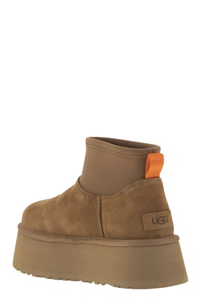 Ugg ® Women's Classic Mini Dipper Suede/neoprene/recycled Materials/polyester Classic Boots In Chestnut In Brown