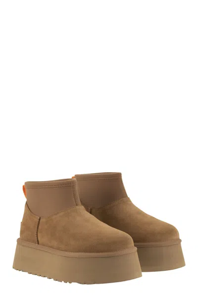 Ugg ® Women's Classic Mini Dipper Suede/neoprene/recycled Materials/polyester Classic Boots In Chestnut In Brown
