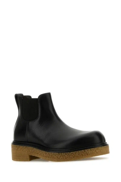 Bottega Veneta Sophisticated Leather Ankle Boots For Men In Black