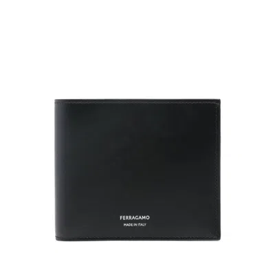 Ferragamo Bi-fold Wallet With Embossed Logo In Smooth Leather Man In Black