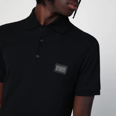 Dolce & Gabbana Short-sleeved Wool Polo Shirt In Black
