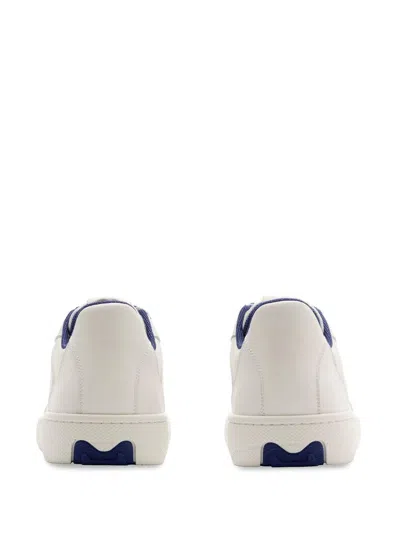 Shop Burberry Sneakers In White