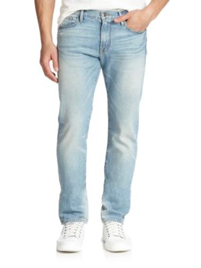 Shop Frame L'homme Slim-fit Jeans In Light-wash