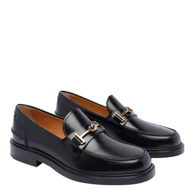 Tod's Loafers With Clamp And Oval Logo Shoes In Black