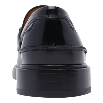 Tod's Loafers With Clamp And Oval Logo Shoes In Black