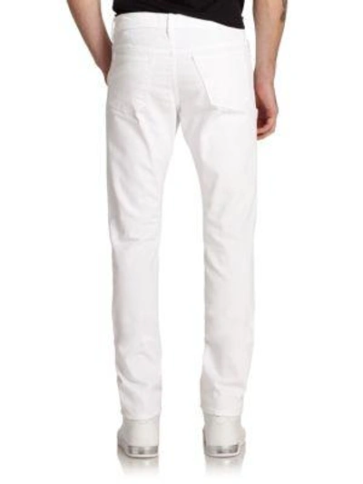 Shop Frame L'homme Slim Fit Jeans In White