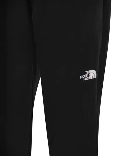 The North Face Reaxion - Fleece Jogger Trousers In Black