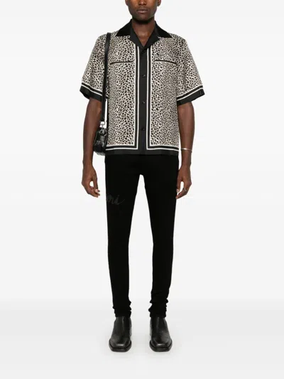 Amiri Script-logo Skinny Jeans