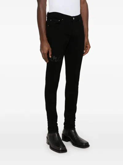 Amiri Script-logo Skinny Jeans