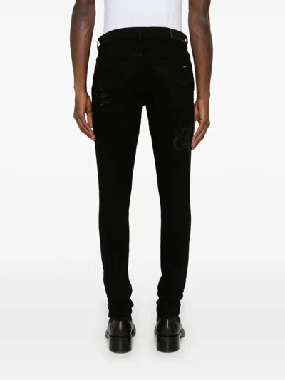 Amiri Script-logo Skinny Jeans