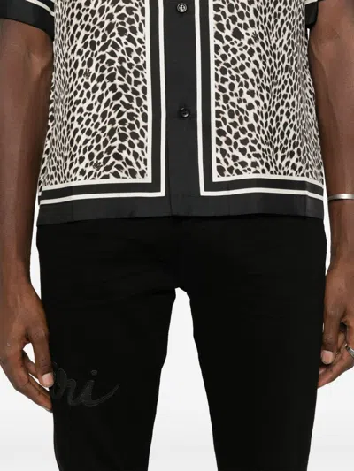Amiri Script-logo Skinny Jeans