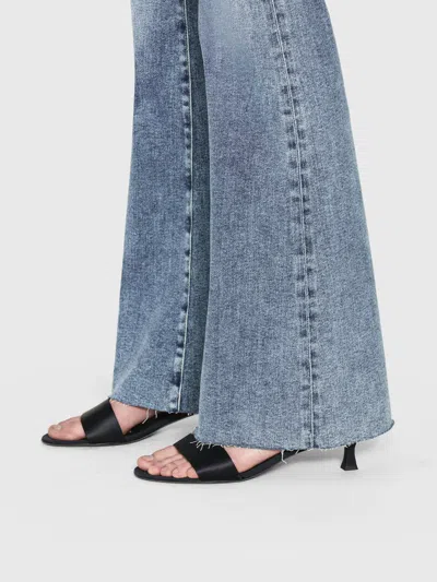 Shop Frame Le Easy Flare Jeans In Blue