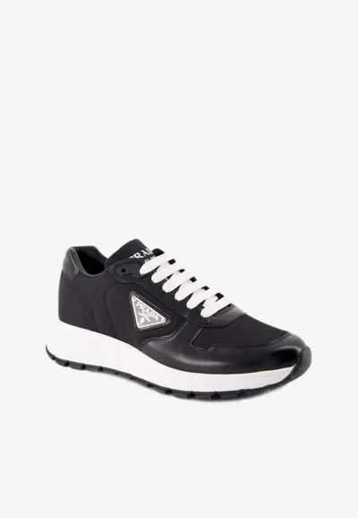 Shop Prada Brax 1 Low-top Sneakers In Black