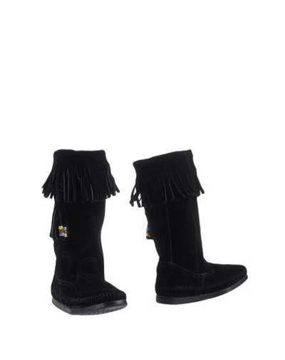Shop Minnetonka Boots In Black