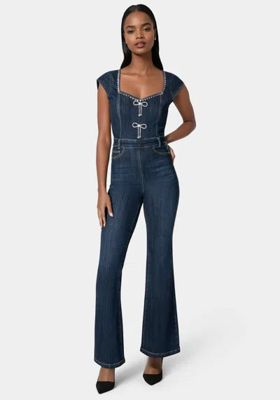 BEBE EMBELLISHED NECKLINE FLARED LEG DENIM JUMPSUIT 