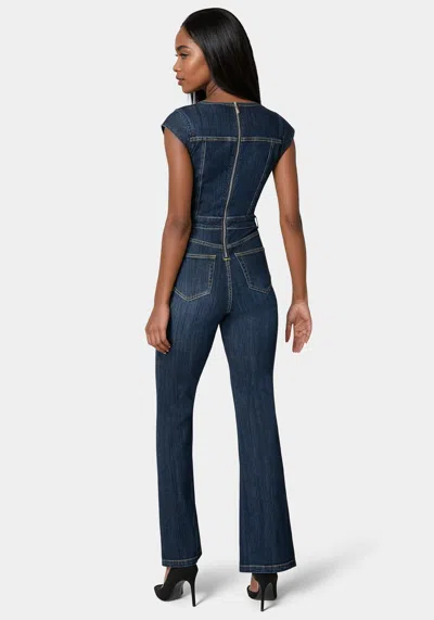 Bebe Embellished Neckline Flared Leg Denim Jumpsuit In Dark Indigo Wash