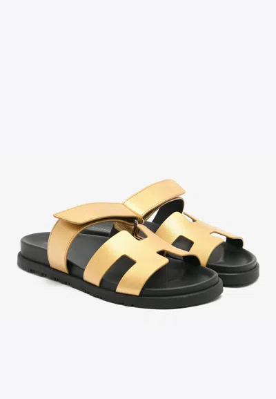 Pre-owned Hermes Chypre Sandals In Dore Metallic Grained Goatskin