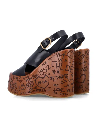 Chloé Maxime Black Wedges With High Embossed High Wedge Heel And Crossover Strap On The Toe In Leather Wom In Black