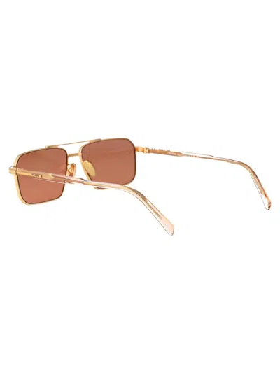 Prada Logo-engraved Rectangle-frame Sunglasses In 5ak07v Gold