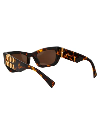 Miu Miu Eyewear Rectangular Frame Sunglasses