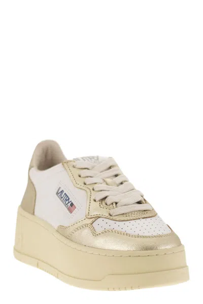 Autry Platform Low-top Sneakers With Platform Sole In Gold