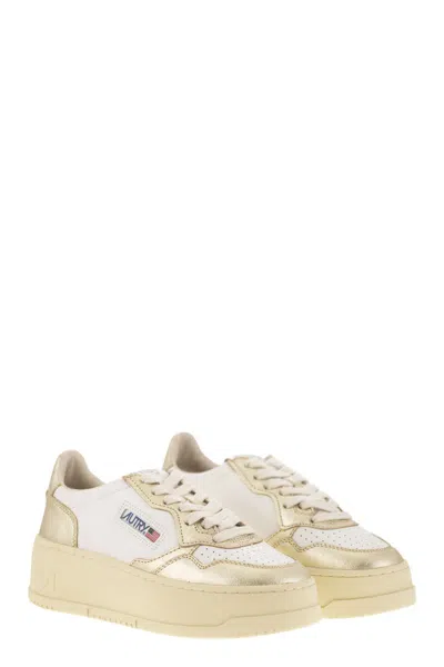 Autry Platform Low-top Sneakers With Platform Sole In Gold