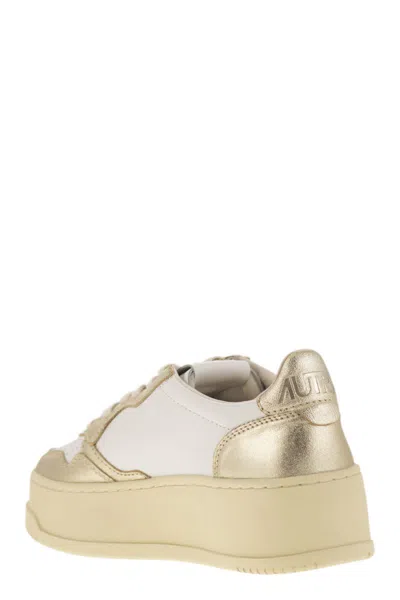 Autry Platform Low-top Sneakers With Platform Sole In Gold