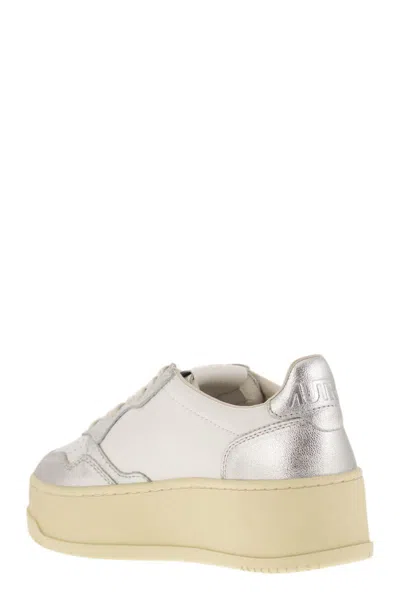 Autry White And Silver Low Top Platform Sneakers With Logo