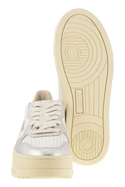 Autry White And Silver Low Top Platform Sneakers With Logo