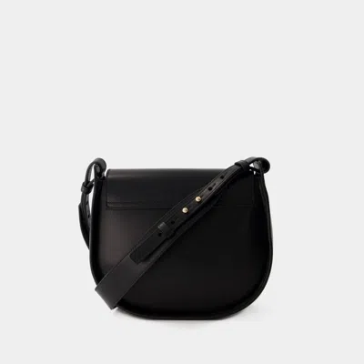 Ines De La Fressange Sleek And Timeless Senda Shoulder Handbag In Camel Leather