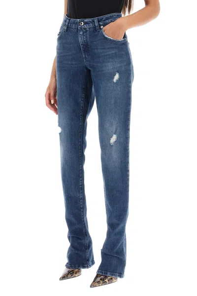 Dolce & Gabbana Destroyed Skinny Jeans With Engraved Metal Accents