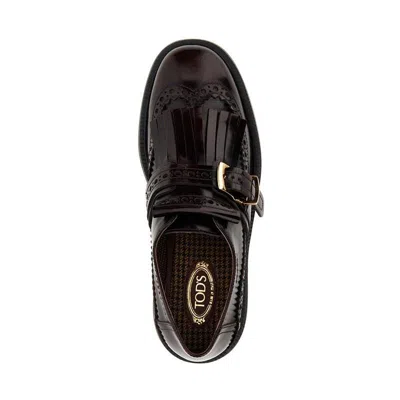 Tod's Burgundy Leather Derby Dress Shoes With Fringed Front And Gold-tone Buckle