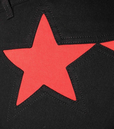 Shop Givenchy Skinny Jeans With Star Panels In Black