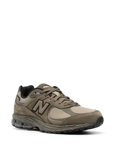 Shop New Balance M2002 Sneakers In Green