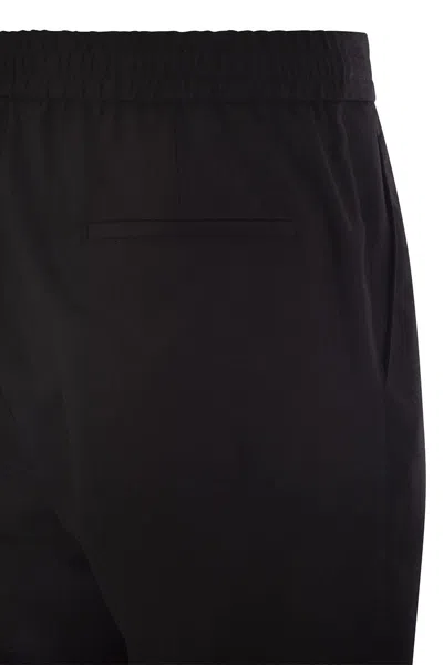 Brunello Cucinelli Men Leisure Fit Trousers In Garment-dyed Linen Gabardine With Drawstring And Doub