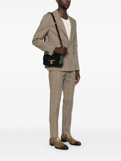 Tod's Calfskin Shoulder Bag With Sleek Design And Gold Hardware Accent