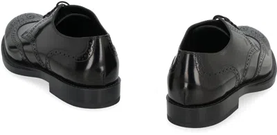 Tod's Lace Up High Shine Brogues