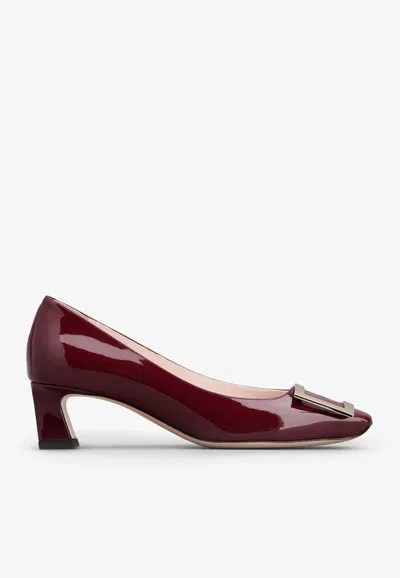 ROGER VIVIER TROMPETTE 45 METAL BUCKLE PUMPS IN PATENT LEATHER 