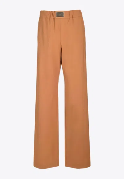 Dolce & Gabbana Logo Tag Tailored Pants In Brown