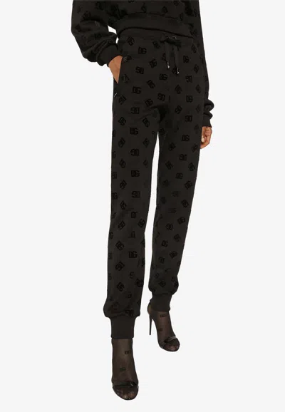 Dolce & Gabbana Flocked Logo Drawstring Waist Joggers In Black