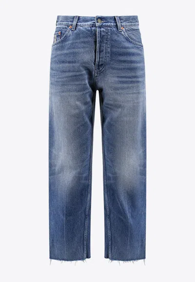 GUCCI LOGO-PATCH WASHED ORGANIC JEANS 