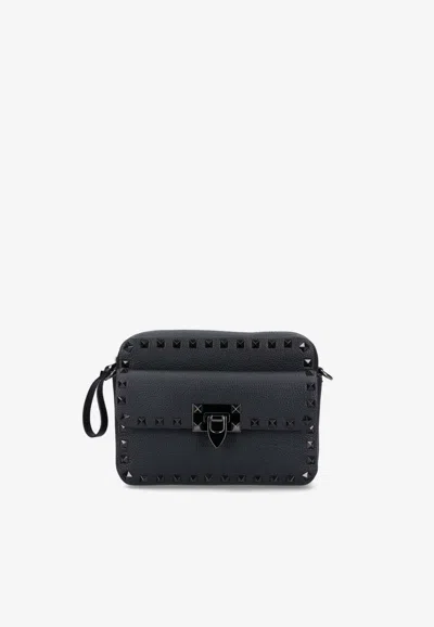 Valentino Rockstud Leather Messenger Bag In Black