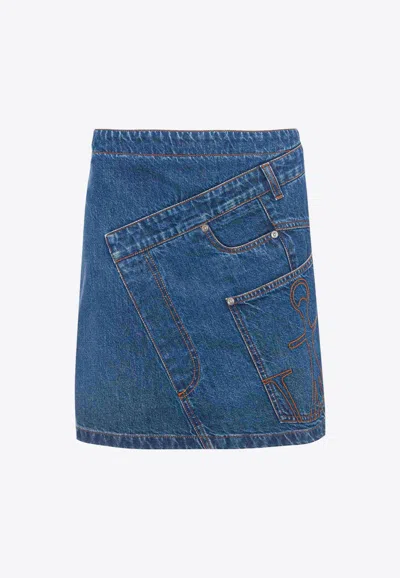Jw Anderson Mini Skirt With Asymmetric Design And Pockets In Denim