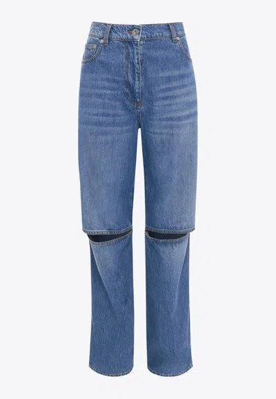 Jw Anderson Cut-out Bootcut Jeans In Denim