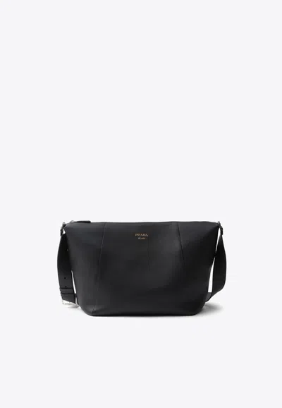 Prada Logo Print Leather Messenger Bag In Black