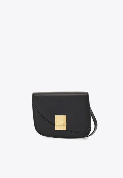 Ferragamo Small Asymmetric Leather Crossbody Bag In Black
