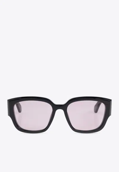 Alexander Mcqueen Engraved-logo Arm Sunglasses In Purple