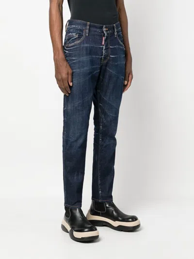 Dsquared2 Trendy Distressed-finish Tapered-leg Denim Jeans For Men