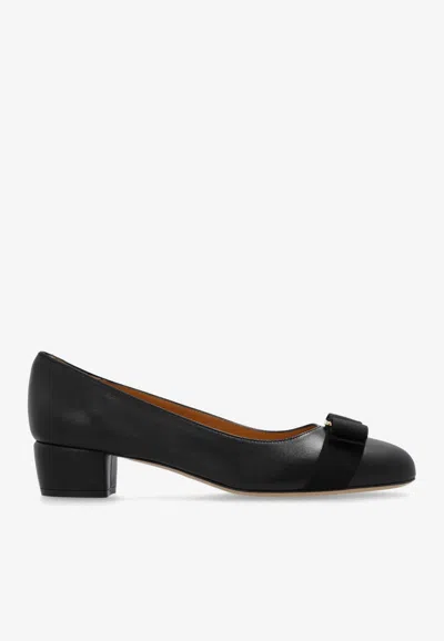 Ferragamo Vara Bow-embellished Patent-leather Pumps In Black