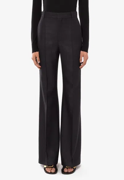 Chloé Broken-heel Low-rise Stretch-wool Pants In Black